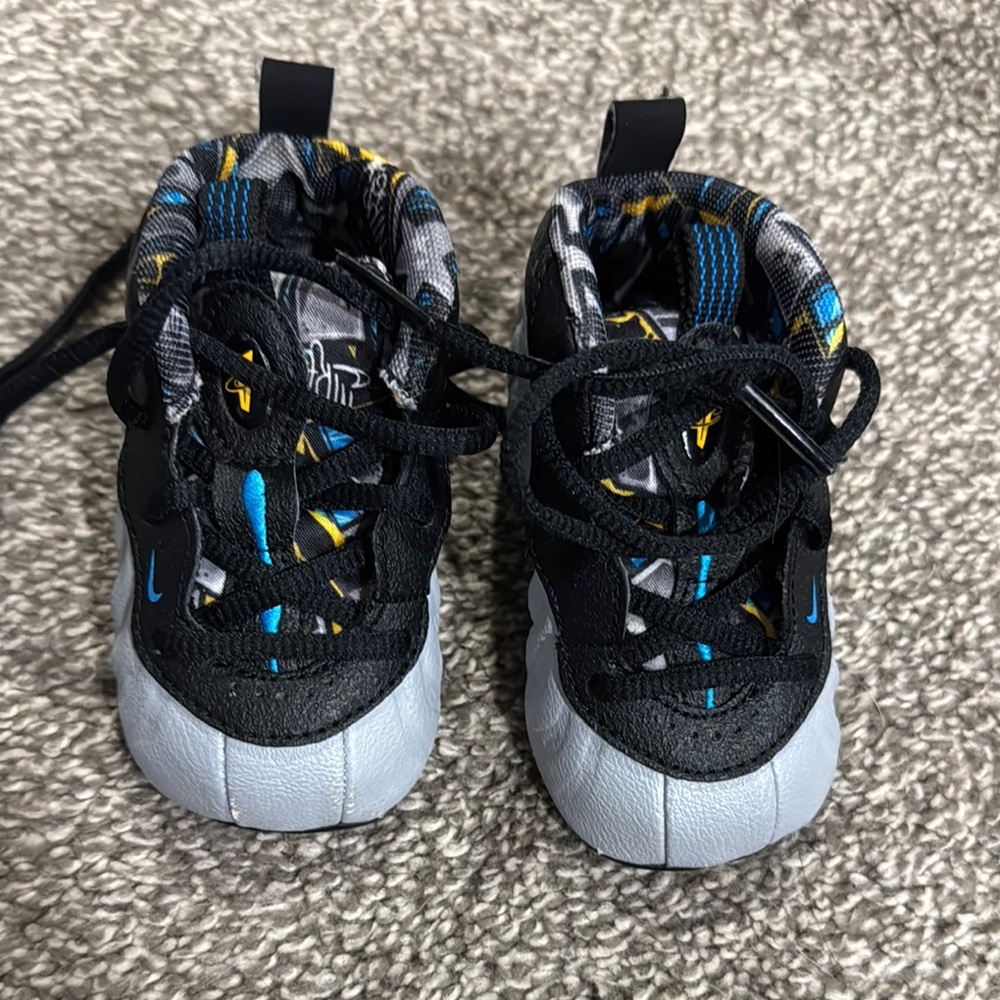 Kids Nike Black and Blue Sneakers